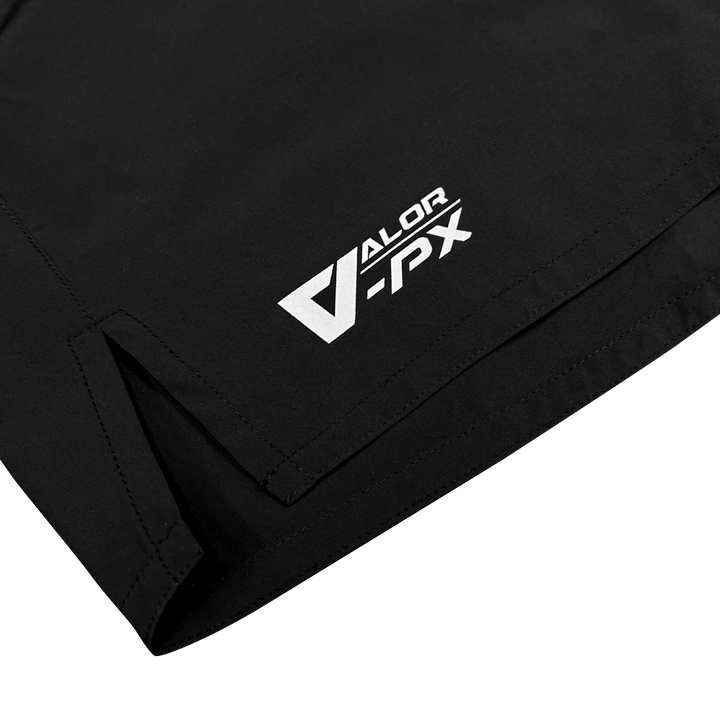 โลโก้ VALOR PX พิมพ์บนผ้าสีดำ ภาพกล้ายแสดงอัตลักษณ์แบรนด์